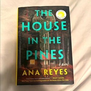 The House in the Pines by Ana Reyes - Black and Yellow Cover